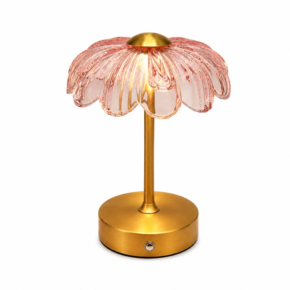 Blush pink petal glass table lamp on a round brass-tone base